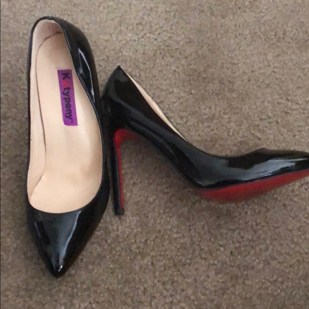 Faux Red bottom pointed to heels